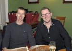 Roman Schuster und Rudi Leopold überlegen bei der Weihnachtsfeier 2014 der Baufirma Lechner, was sie noch alles essen sollen